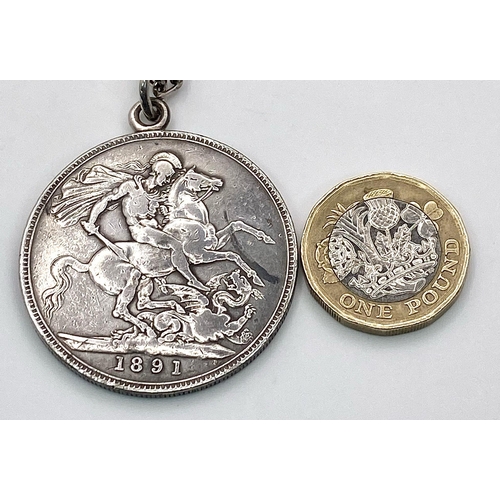 359 - An 1891 Queen Victoria Silver Crown in a Pendant Setting on a Sterling Silver Chain. 41.21g total we... 