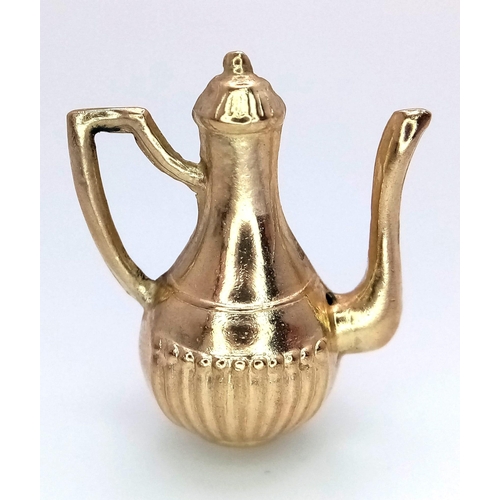 366 - A 9K Yellow Gold Coffee Pot Pendant/Charm. 2.5cm. 1.92g weight.