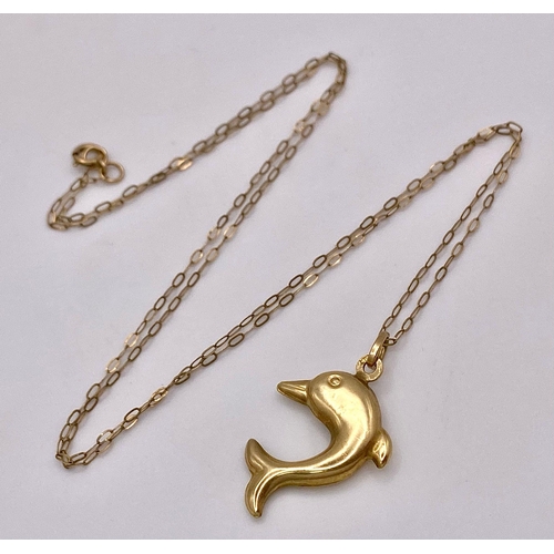 415 - A 9K Yellow Gold Dolphin Pendant on a 9K Yellow Gold Disappearing Necklace. 3cm and 46cm. 1g total w... 