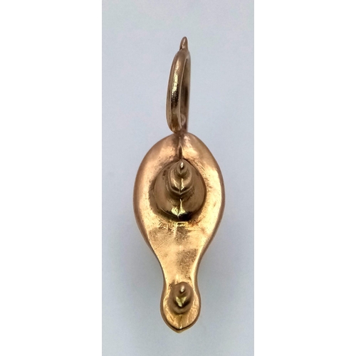 506 - A 9K Yellow Gold Genie Lamp Pendant/Charm. 3cm. 1.4g weight.