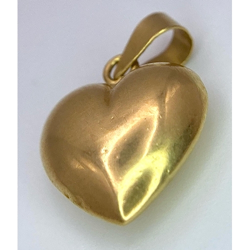 541 - An 18K Yellow Gold Heart Pendant. 2cm. 0.70g.