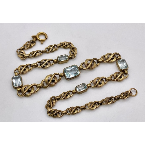 892 - A Vintage 9K Yellow Gold and Aquamarine Intricate Link Necklace. 38cm. 12.5g total weight.