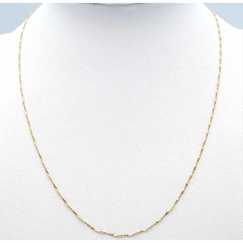 1466 - A 9K Yellow Gold Disappearing Necklace. 40cm length. 1.15g weight.