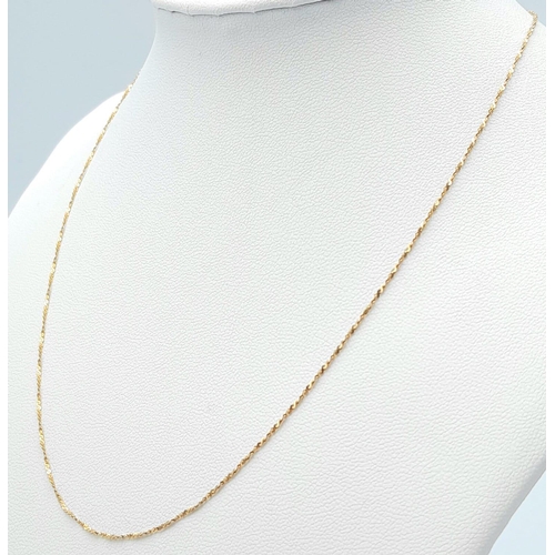 1466 - A 9K Yellow Gold Disappearing Necklace. 40cm length. 1.15g weight.