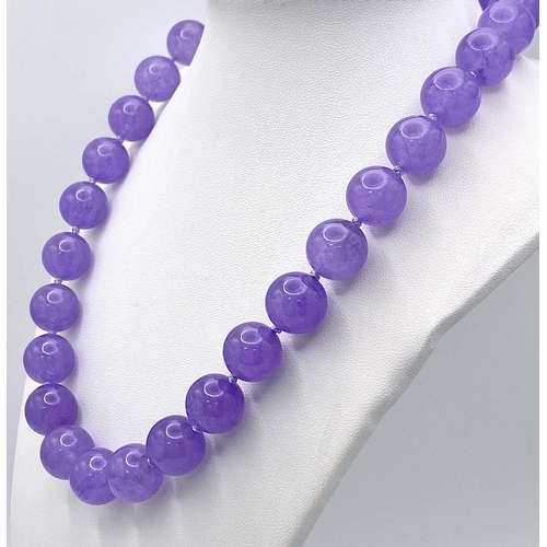 395 - A Vibrant Large Lavender Jade Bead Necklace. 14mm beads. 42cm necklace length.