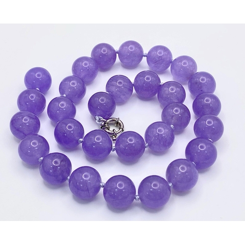 395 - A Vibrant Large Lavender Jade Bead Necklace. 14mm beads. 42cm necklace length.