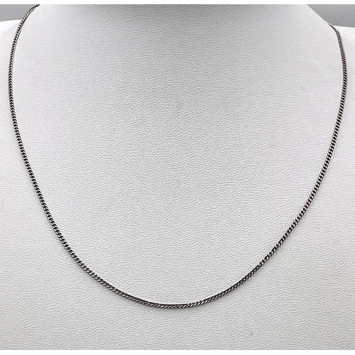 547 - A 9K White Gold Disappearing Necklace. 40cm length. 2.3g weight.