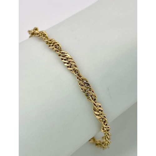 925 - A 14K Yellow Gold Intricate Link Bracelet. 17cm. 2g weight.