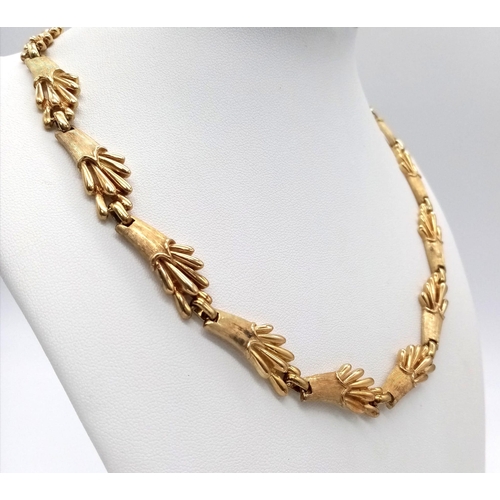 101 - A Vintage 18K Yellow Gold Substantial Harvest-Burst Link Necklace. 44cm length. 66.37g weight.