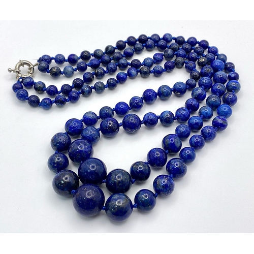 478 - A Two Strand Lapis Lazuli Graduating Bead Necklace. 7-14mm. 44cm necklace length.