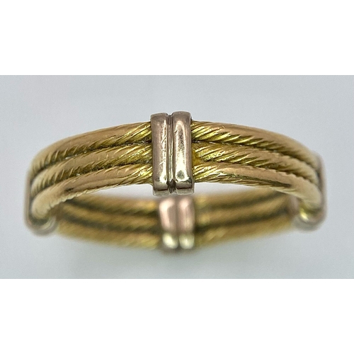 617 - An 18K Yellow Gold Three Band Ring. Size V. 6.95g weight.