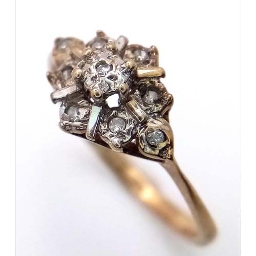 1271 - A Vintage 9K Yellow Gold Diamond Cluster Ring. Size H. 1.05g weight.