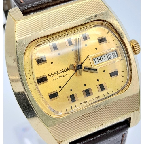 1412 - A Vintage Sekonda 19 Jewels Mechanical Gents Watch. Brown leather strap. Gilded TV screen shaped cas... 