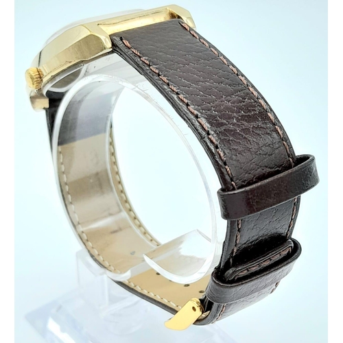 1412 - A Vintage Sekonda 19 Jewels Mechanical Gents Watch. Brown leather strap. Gilded TV screen shaped cas... 