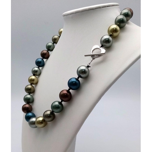 1426 - A Multi-Colour Metallic South Sea Pearl Shell Bead Necklace. Silver, shades of gold and blue 12mm be... 