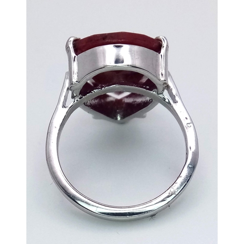 1440 - A Pear-Shaped Ruby Gemstone set Ring. Set in 925 silver. Weight - 7.70 gm . 20ct-Ruby. Size Q. Comes... 