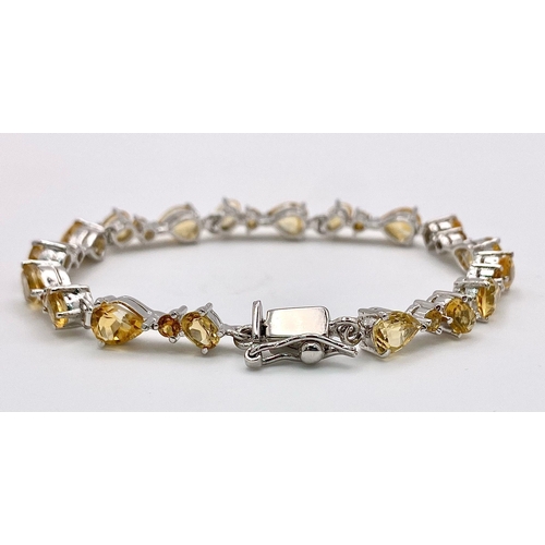 485 - A Rich Citrine Gemstone Tennis Bracelet set in 925 Silver. 19cm length. Weight - 19 gm. Ref: HV-2166