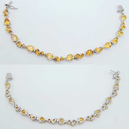 485 - A Rich Citrine Gemstone Tennis Bracelet set in 925 Silver. 19cm length. Weight - 19 gm. Ref: HV-2166