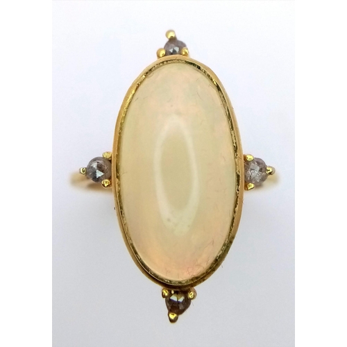 562 - A 4.5ct Oval Ethiopian Fire Opal and Diamond Gold Plated 925 Silver Ring. Size M. 4.4g total weight.... 