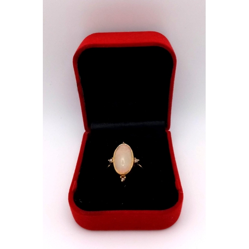 562 - A 4.5ct Oval Ethiopian Fire Opal and Diamond Gold Plated 925 Silver Ring. Size M. 4.4g total weight.... 