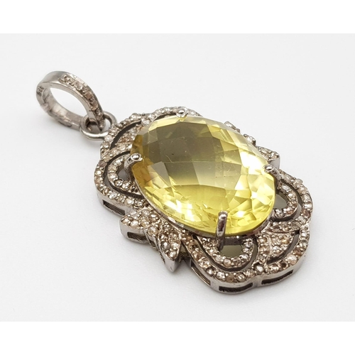 933 - An Oval Faceted Lemon Quartz and Diamond Art Deco Style Pendant set in 925 Silver. 4cm. Weight - 7.5... 