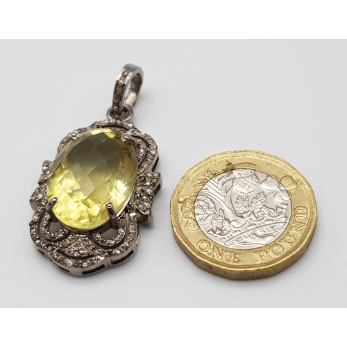 933 - An Oval Faceted Lemon Quartz and Diamond Art Deco Style Pendant set in 925 Silver. 4cm. Weight - 7.5... 