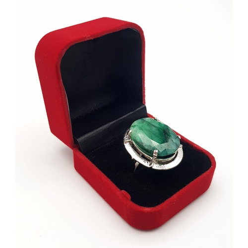 1191 - An Oval Shaped Brazilian Emerald 925 Silver Ring. Size P. Weight - 18.80g. Comes in a presentation c... 