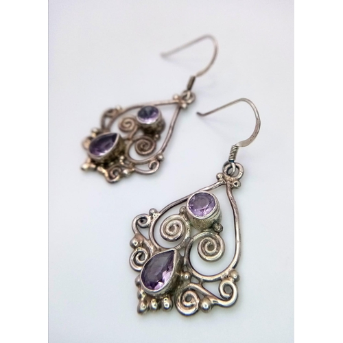 1373 - A Pair of Art Deco Style 925 Silver Amethyst Gemstone Earrings. 3cm. Weight - 7.20g. Comes in a pres... 