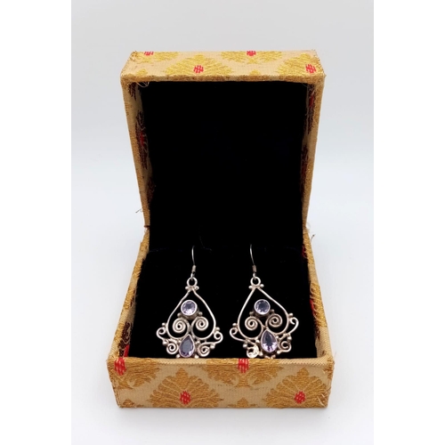 1373 - A Pair of Art Deco Style 925 Silver Amethyst Gemstone Earrings. 3cm. Weight - 7.20g. Comes in a pres... 