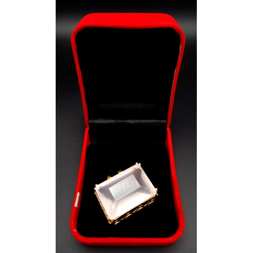 694 - A Rectangular Shaped Rose Quartz Gemstone Pendant set in Gold Plated Silver - With diamond accents. ... 