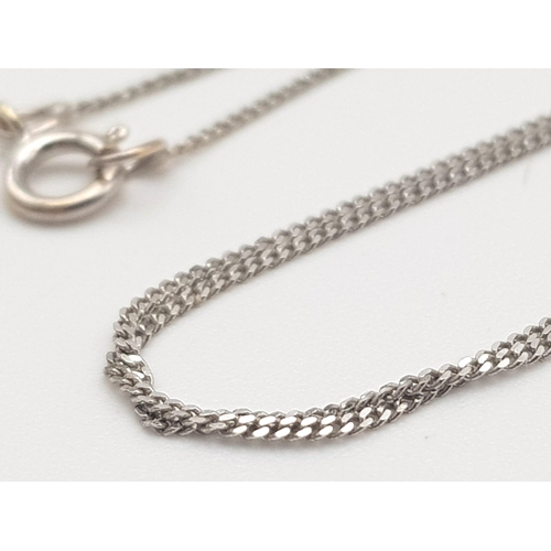 821 - A 9K White Gold Disappearing Necklace. 45cm length. 0.77g weight.