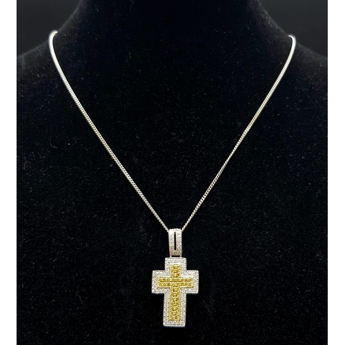 1165 - An 18K White and Yellow Gold Diamond Encrusted Cross Pendant on an 18K White Gold Disappearing Neckl... 