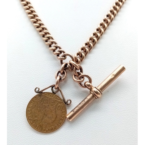 136 - An Antique 9K Rose Gold Albert Chain with Spinning Fob Gold (900 purity) 10 Franc Coin. 45cm length.... 