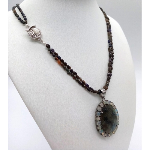 261 - An Ethiopian Black Opal Bead Necklace with a Labradorite 925 Silver Pendant with White Fire Opal Sto... 