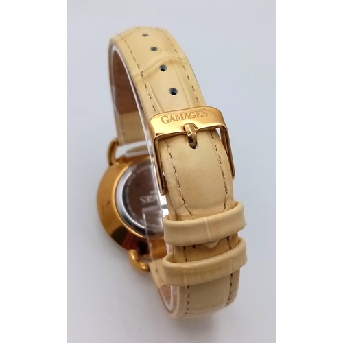 361 - An Unused, Limited Edition, Gamages of London Gold Tone ‘Symphony Watch’ Model 8984. The Design was ... 