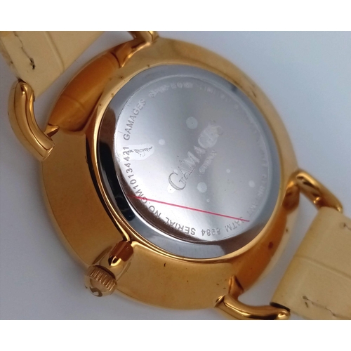 361 - An Unused, Limited Edition, Gamages of London Gold Tone ‘Symphony Watch’ Model 8984. The Design was ... 