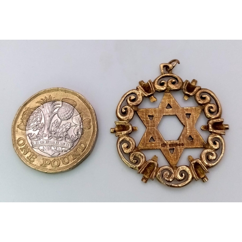 498 - A Vintage 9K Yellow Gold Star of David Pendant. 3cm diameter. 6.15g weight.