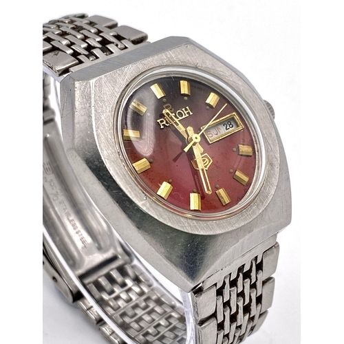 527 - A Vintage Ricoh 21 Jewels Automatic Gents Watch. Stainless steel bracelet and case - 37mm. Red dial ... 