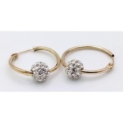 814 - Two Pairs of 9K Gold White Stone earrings - Stud and Hoop Glitterball. 1.15g total weight.