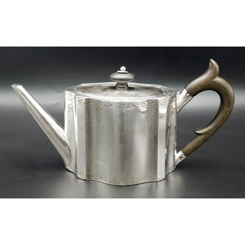 129 - A 1785 Hester Bateman George III Silver Teapot. Oval form with empty cartouche to side. Minimalist g... 