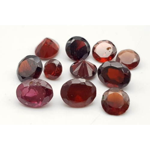 929 - A Parcel of 11 Garnets. Oval Cuts. 15.02 Carats.