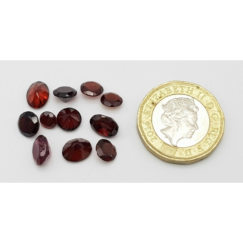 929 - A Parcel of 11 Garnets. Oval Cuts. 15.02 Carats.