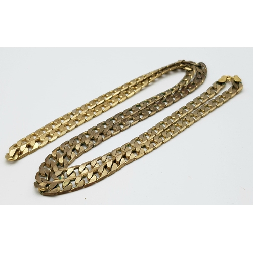 143 - A Vintage Italian 9K Yellow Gold Flat Curb Link Chain. 74cm length. 34.3g weight.