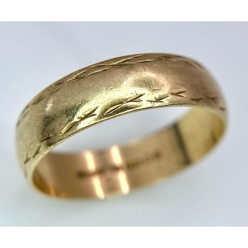 513 - A Vintage 9K Yellow Gold Band Ring. 5mm width. Size K. 1.9g weight. Full UK hallmarks.