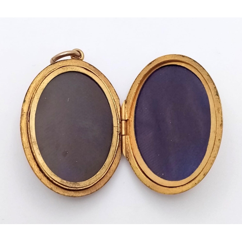 519 - An Antique 9K Yellow Gold (front and back) Picture Locket - Seed pearl and amethyst decoration. 4cm.... 