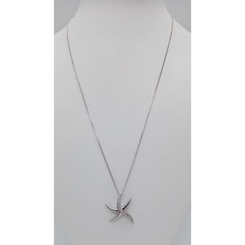 845 - A New Sterling Silver White Topaz Set Starfish Pendant Necklace. Sterling Silver Pendant Measures 2.... 