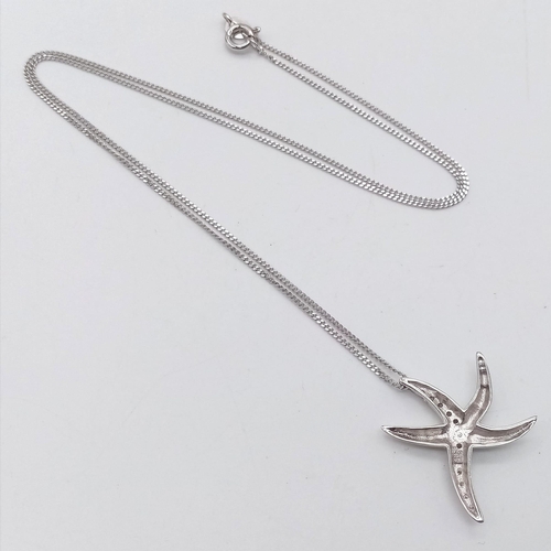 845 - A New Sterling Silver White Topaz Set Starfish Pendant Necklace. Sterling Silver Pendant Measures 2.... 