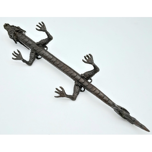 613 - An Antique Japanese Bronze Dragon Ornament 15.5cm Length.