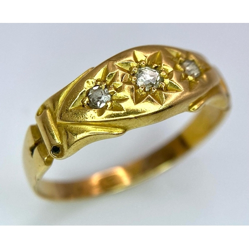 696 - An Antique 18K Yellow Gold Three Stone Diamond Ring. Three bright white diamonds in star settings. S... 