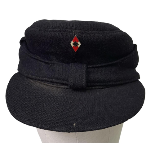 300 - A 3rd Reich Hitler Youth Winter Cap. Late War non buckle example. Good condition for its age with no... 